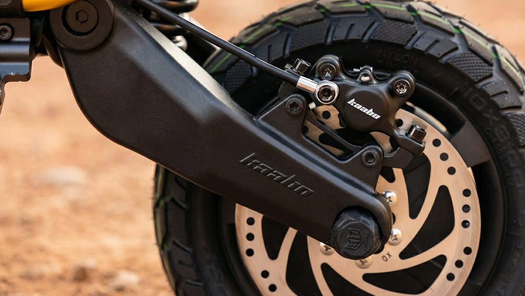 Close-up view of the hydraulic brake system on the Kaabo Warrior X Max electric scooter, showcasing its high-performance braking capabilities.