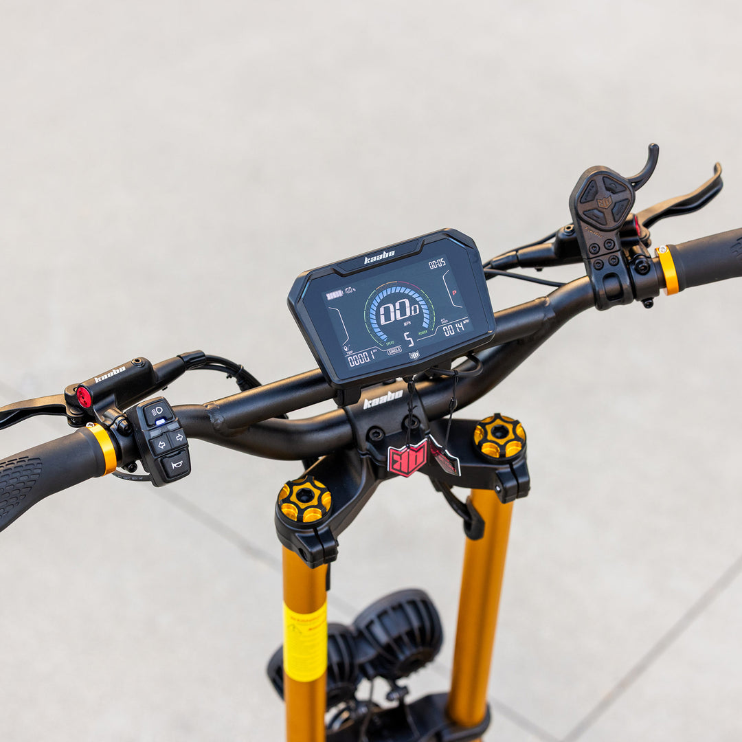 Kaabo Wolf Warrior X Max electric scooter handlebar with LCD display, throttle, control buttons, and front suspension