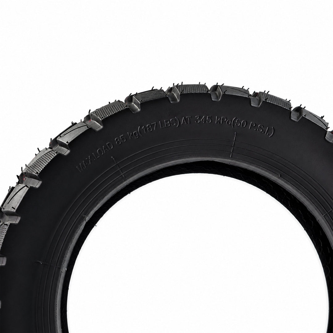 Sidewall close-up of a Kaabo 10-inch off-road electric scooter tire showing the load and pressure markings.