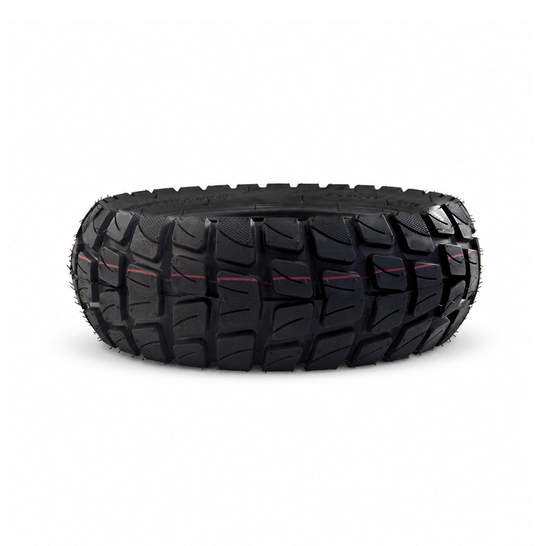 Close-up of the deep off-road tread on a Kaabo 10-inch electric scooter tire.