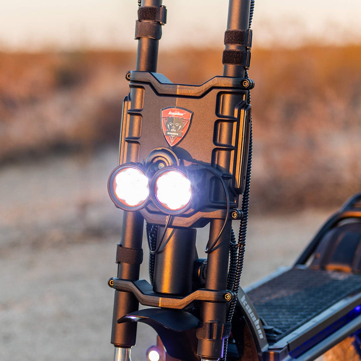 Kaabo King GTR dual front headlights providing bright illumination on a high performance electric scooter for adults