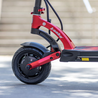 Kaabo USA Mantis 10 Lite electric scooter showcasing the front wheel and red suspension detail