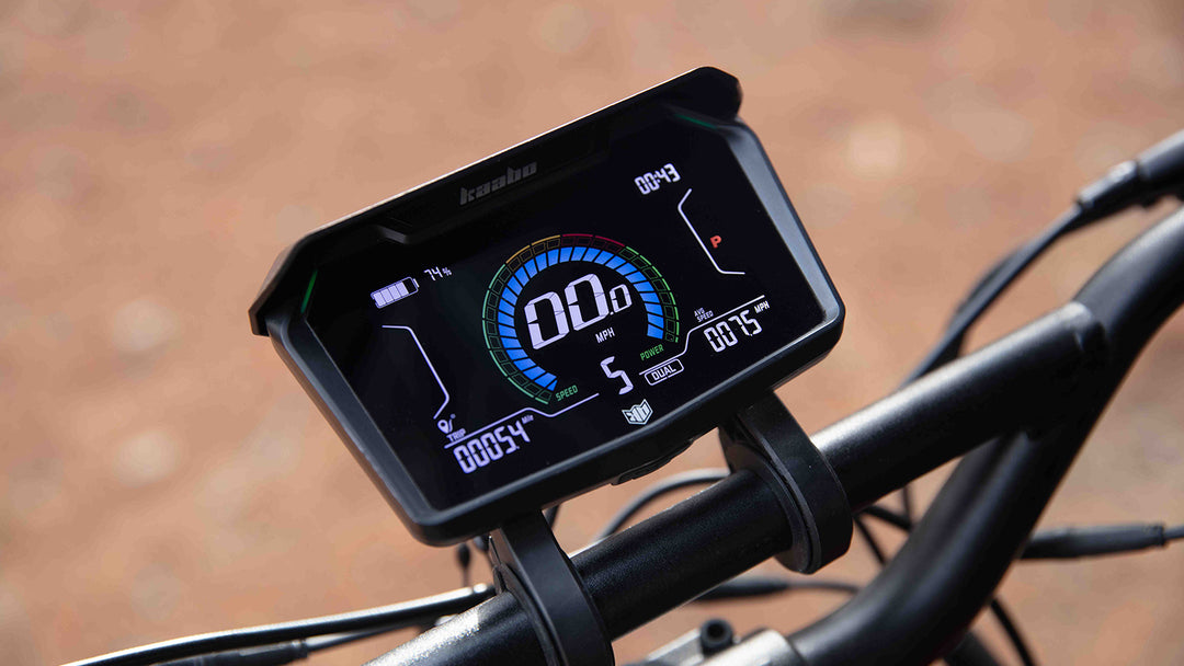 Close-up view of the Kaabo Warrior X Max dual-motor electric scooter’s smart center display, showing key information such as speed, power mode, and battery level for an enhanced riding experience.